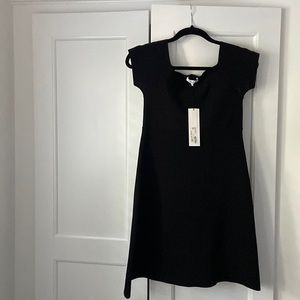 Black mini dress. A line cut.